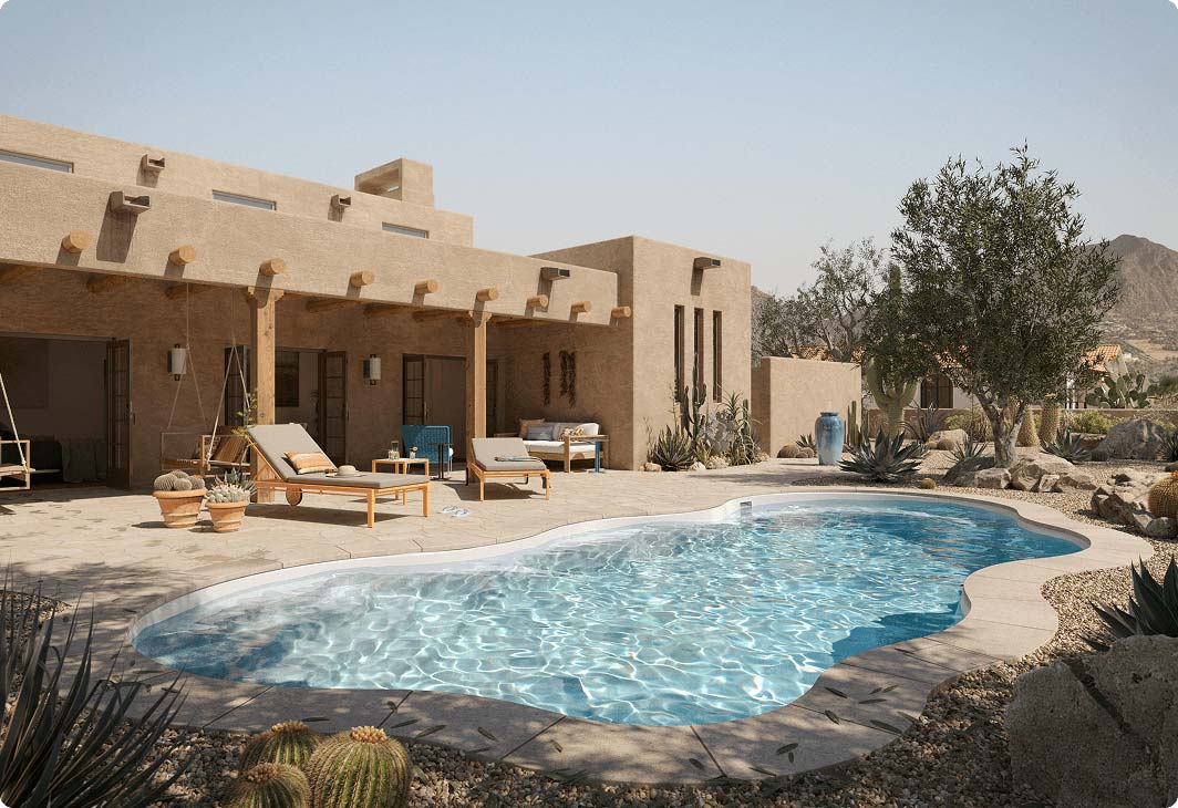 Pool in a desert or mountain setting with lounge chairs and sparse trees in the background.