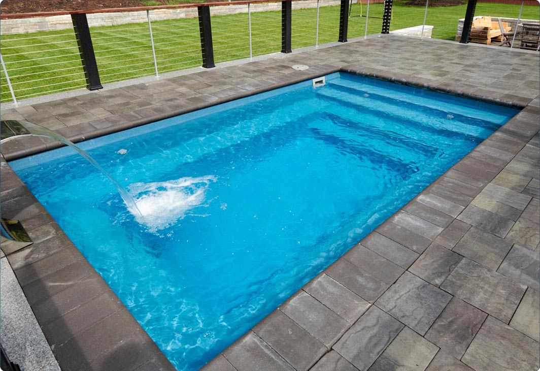 View of a compact plunge pool in a backyard