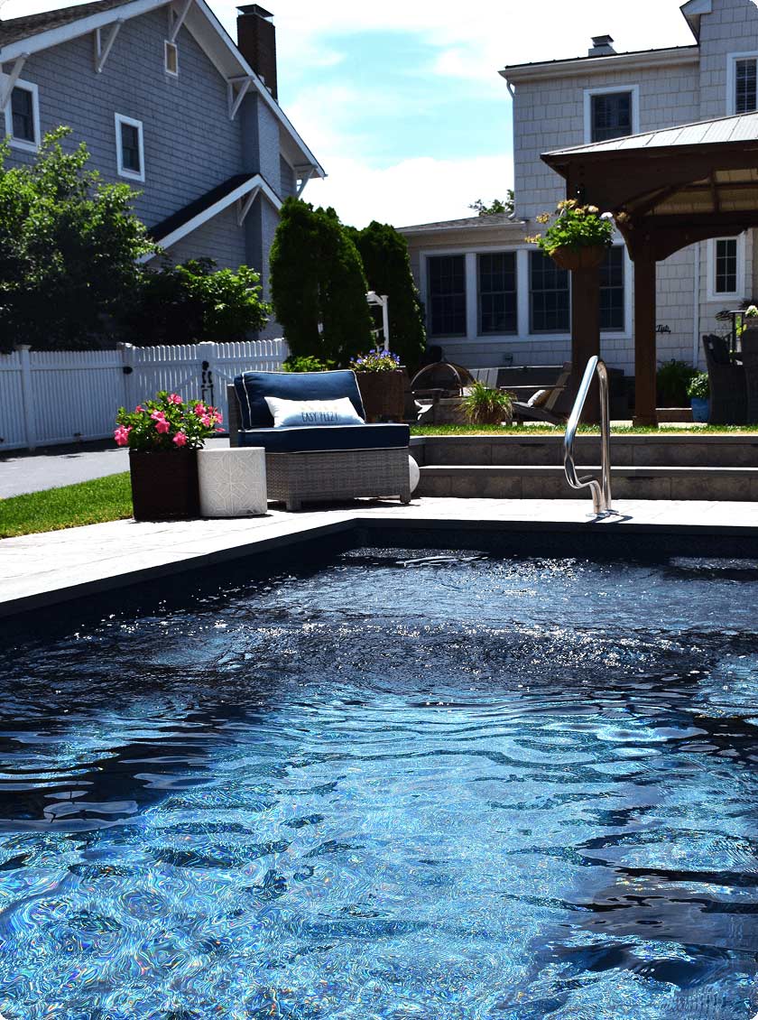 inground pool featuring the layered structure of composite pool material.