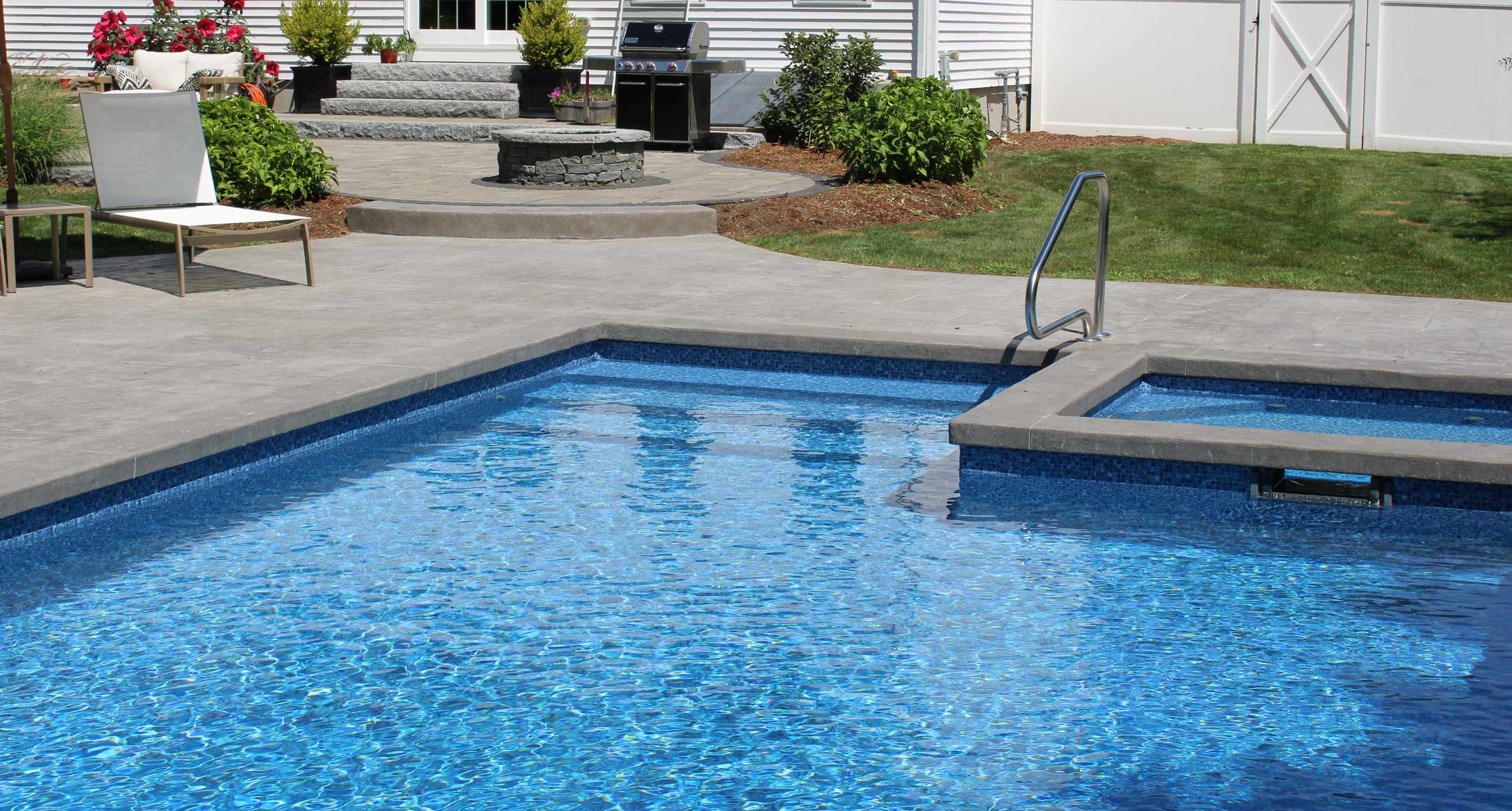 inground vinyl liner pool with walk in steps and spa