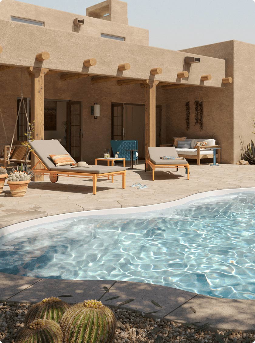 Southwestern style backyard with cactus lounge chairs and fiberglass inground pool