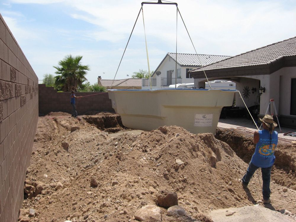 Latham fiberglass pool installation process - setting the pool.