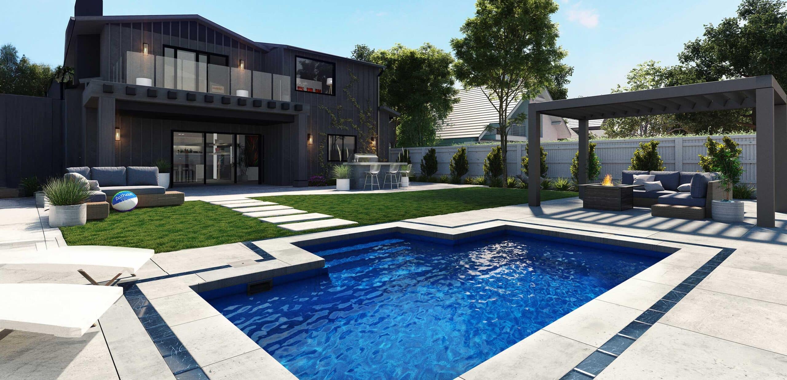 Plunge pool in a nicely landscaped backyard with lounge chairs and an outdoor couch