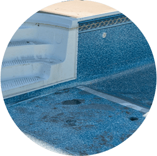 stained and discolored vinyl liner in pool